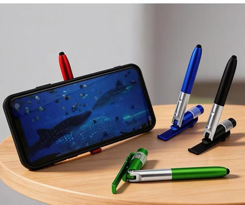 Multi Function Toy Pen 4 in 1  - Phone Stands recension och pris